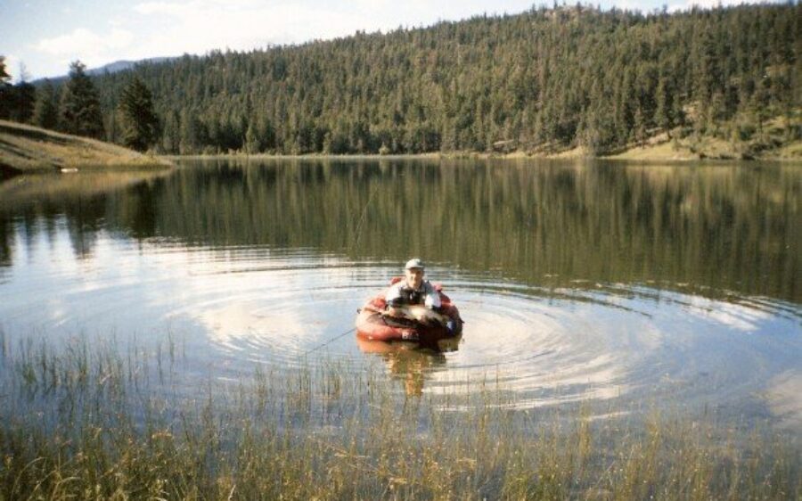 A small lake in BC’s backcountry with clear water and defined shoals